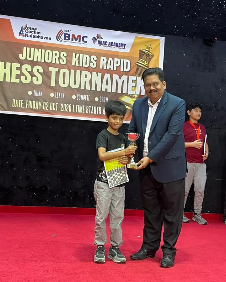 ChessWize student with a trophy at Juniors Kids Rapid, Bahrain