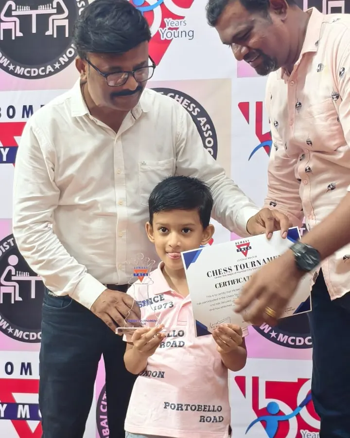 ChessWize student with a trophy at Bombay YMCA tournament, Mumbai